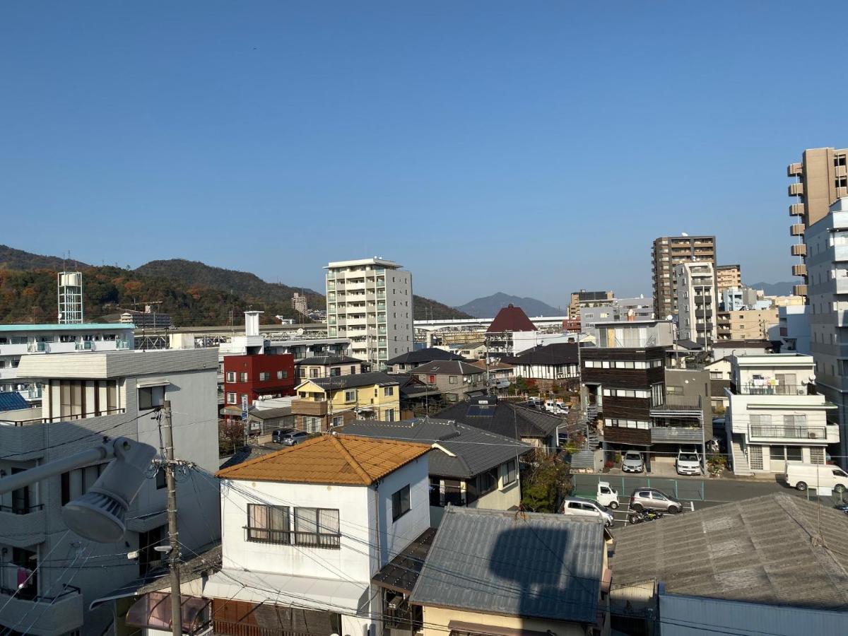 Pensión com inn Hiroshima Exterior foto